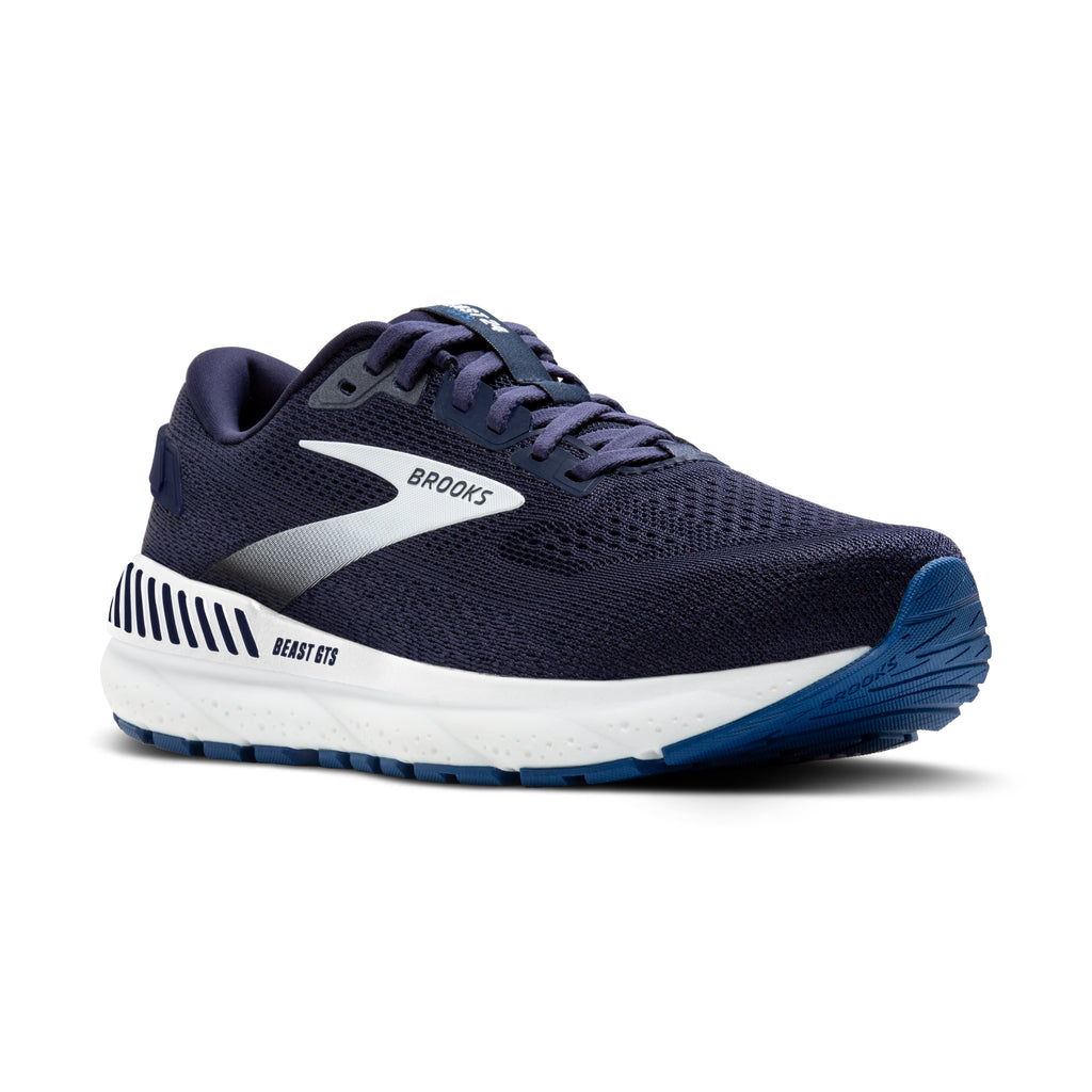Men's Brooks Beast 24. Blue upper. White midsole. Lateral view.