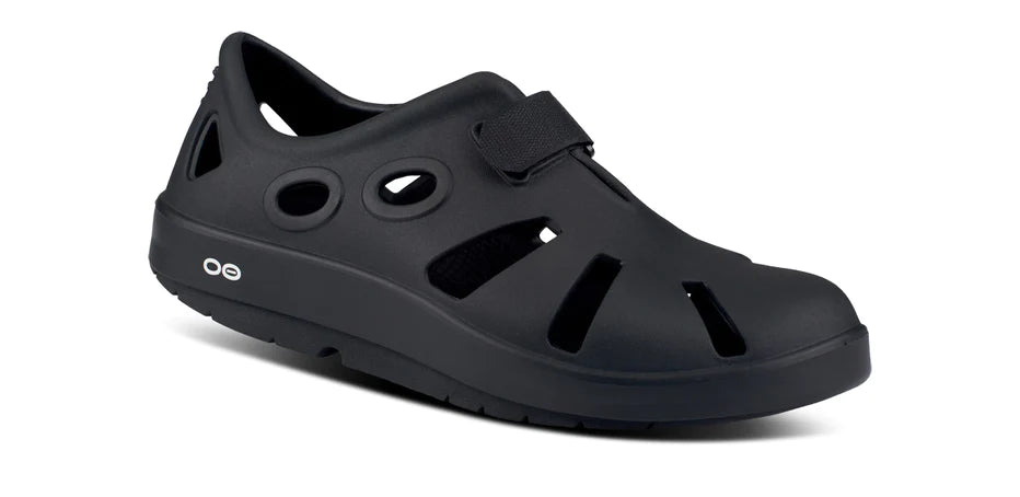 Oofos Oocandoo Sandal. Black. Lateral view.