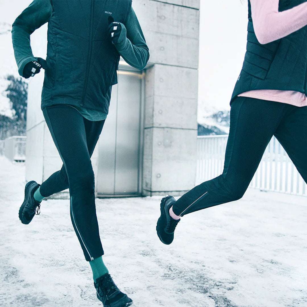 CEP Winter Run Pants Women's Black, shown in use