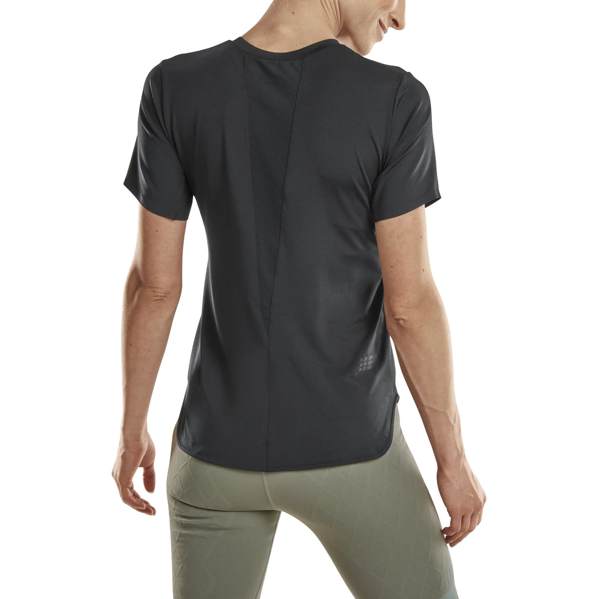 Women's CEP Run Shirt. Black. Rear view.