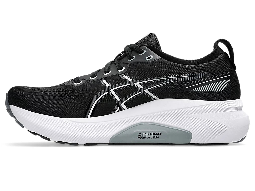 Men's Asics Gel-Kayano 31. Black upper. White midsole. Medial view.