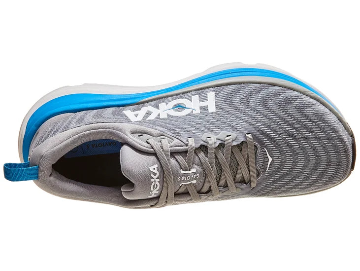 Men's Hoka Gaviota 5. Grey upper. Blue/white midsole. Top view.
