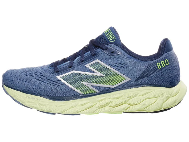 Men's New Balance 880 v14. Dark Grey upper. Off White midsole. Lateral view.