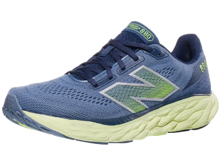 Men's New Balance 880 v14. Dark Grey upper. Off White midsole. Lateral view.