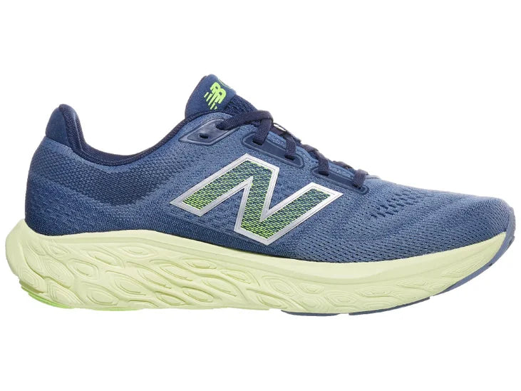 Men's New Balance 880 v14. Dark Grey upper. Off White midsole. Medial view.