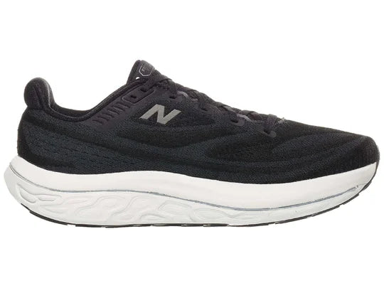 Men's New Balance Vongo v6. Black upper. White midsole. Medial view.
