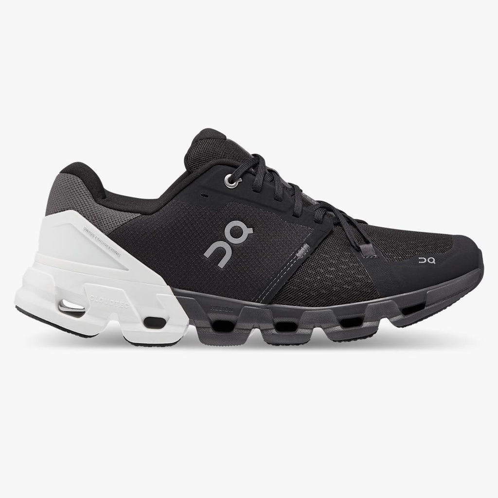 Men's On Cloudflyer 4. Black upper. Black midsole. Lateral view.