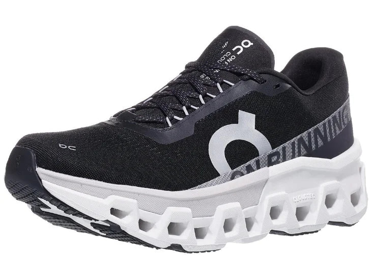 Men's On Cloudmonster 2. Black upper. White midsole. Lateral view.