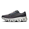 Men's On Cloudmonster 3. Grey and purple upper. White midsole. Medial view.