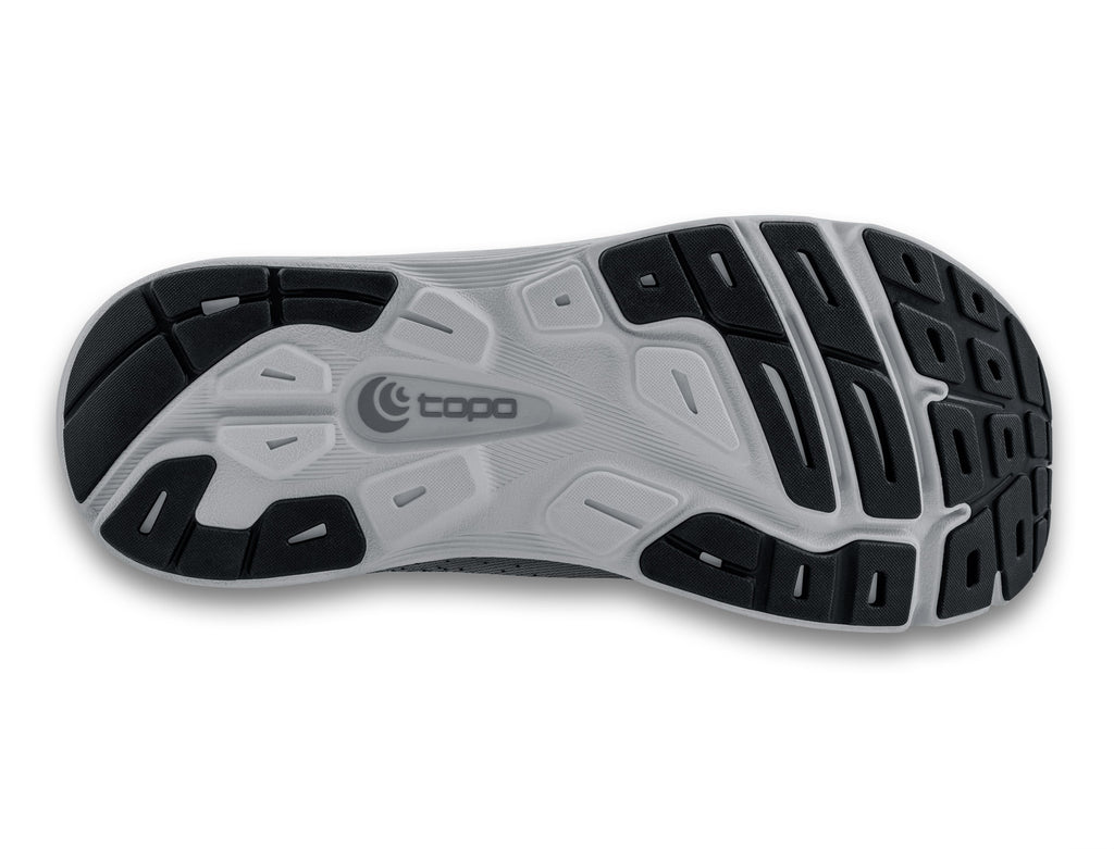Men's Topo Magnifly 5. Grey upper. White midsole. Bottom view.