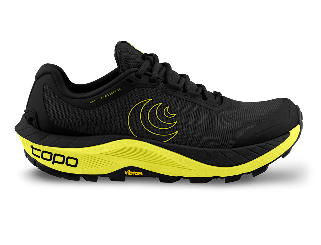 Men's Topo Athletic Mtn Racer 3. Black upper. Green/yellow midsole. Lateral view