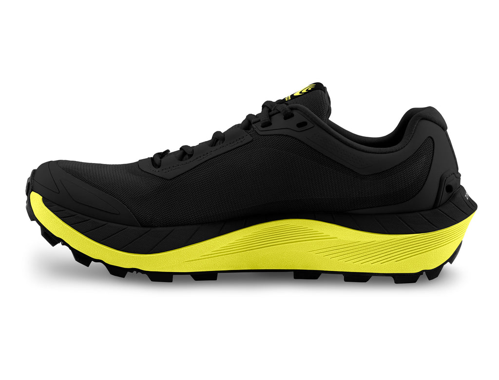 Men's Topo Athletic Mtn Racer 3. Black upper. Green/yellow midsole. Medial view