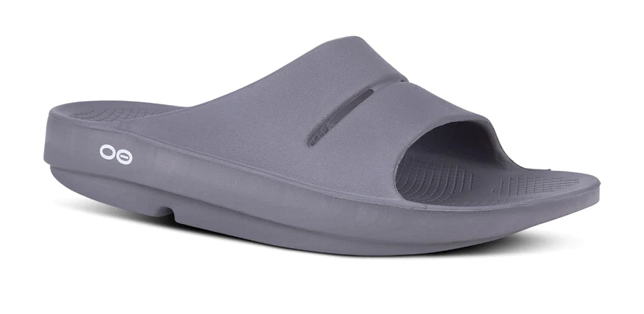 Oofos Ooahh Slide. Gray. Lateral view.