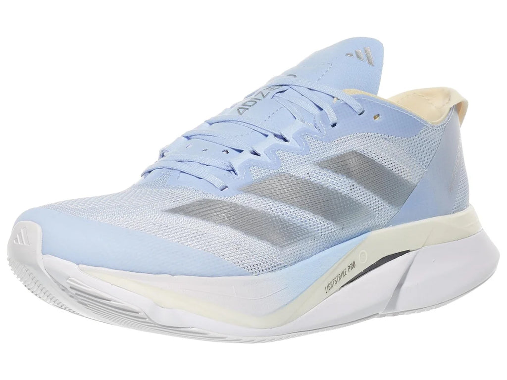 Women's Adidas Adizero Boston 12. Blue upper. Blue, cream, and white midsole. Grey logo. Lateral view.