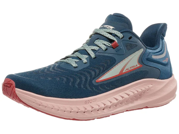 Women's Altra Torin 7. Navy upper. Light pink midsole. Lateral view.