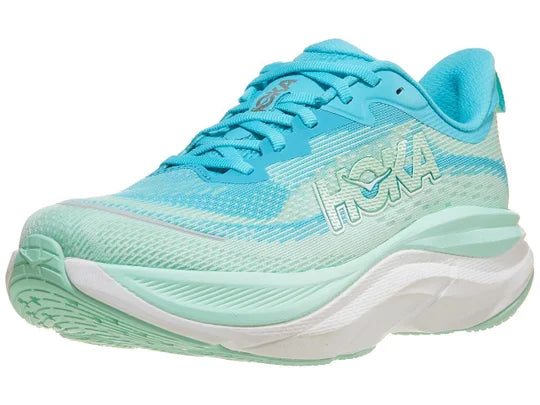 Women's Hoka Skyflow. Light Green/Light Blue upper. White midsole. Lateral view.