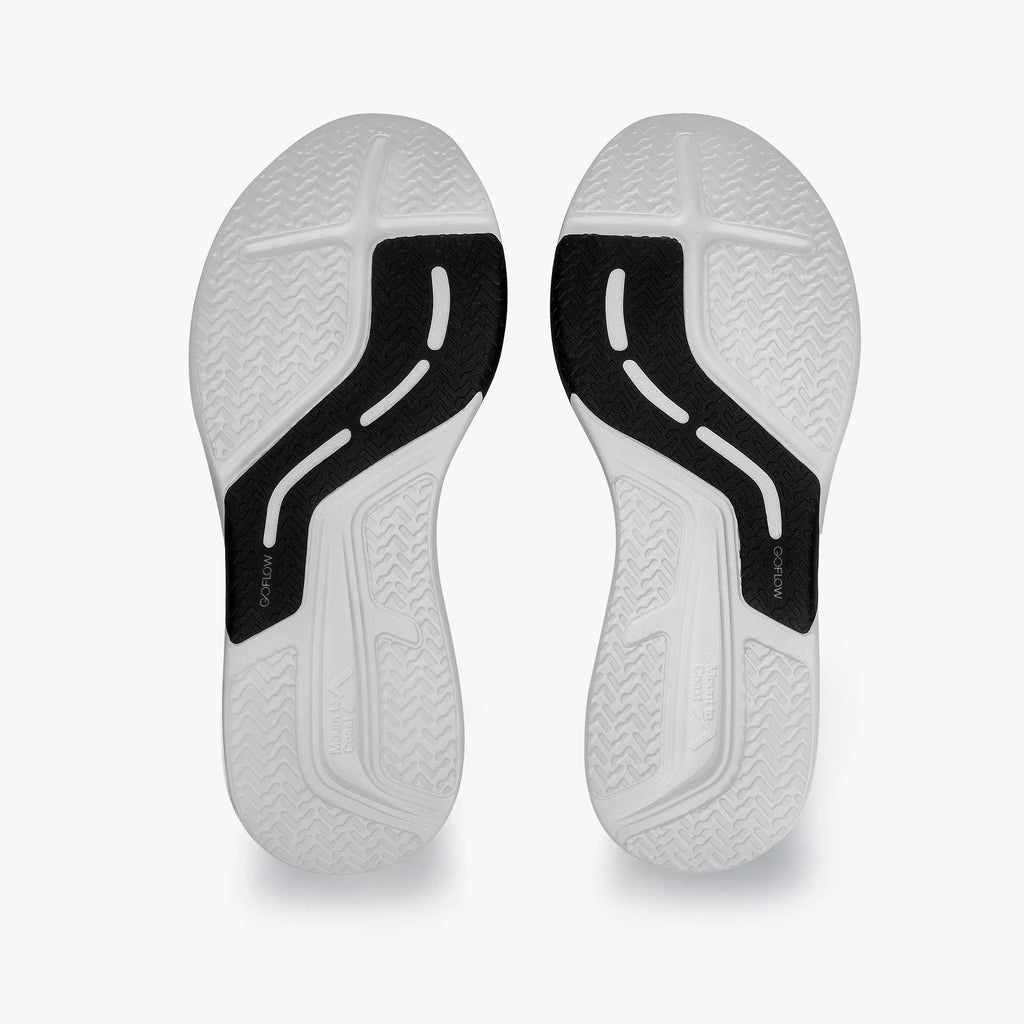 Women's Mount to Coast. R1. White upper. White midsole. Bottom view.