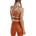 Women's CEP Bloom Crop Top. Orange/White. Rear view.