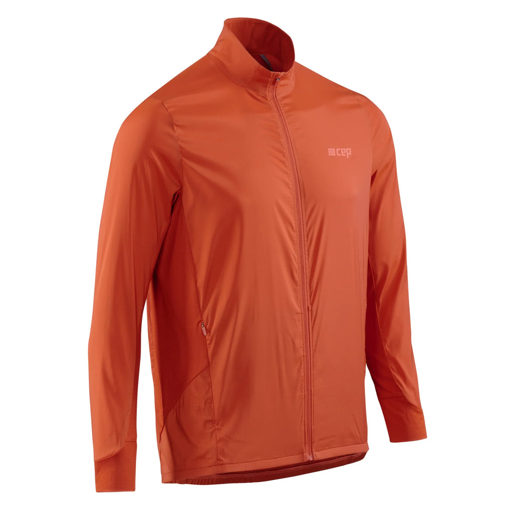 Men's CEP Cold Weather Windbreaker. Dark Orange. Front view.