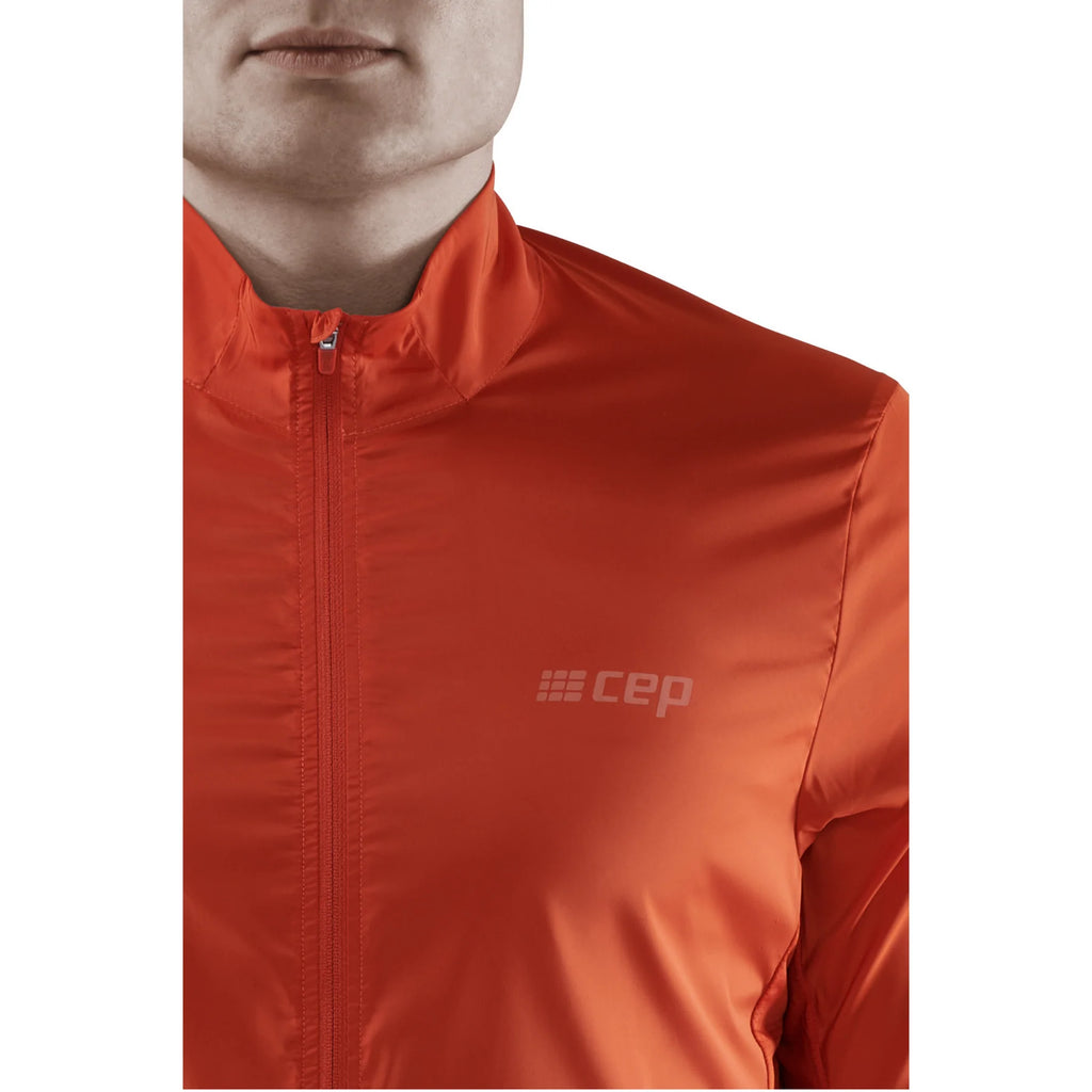 Men's CEP Cold Weather Windbreaker. Dark Orange. Front view.