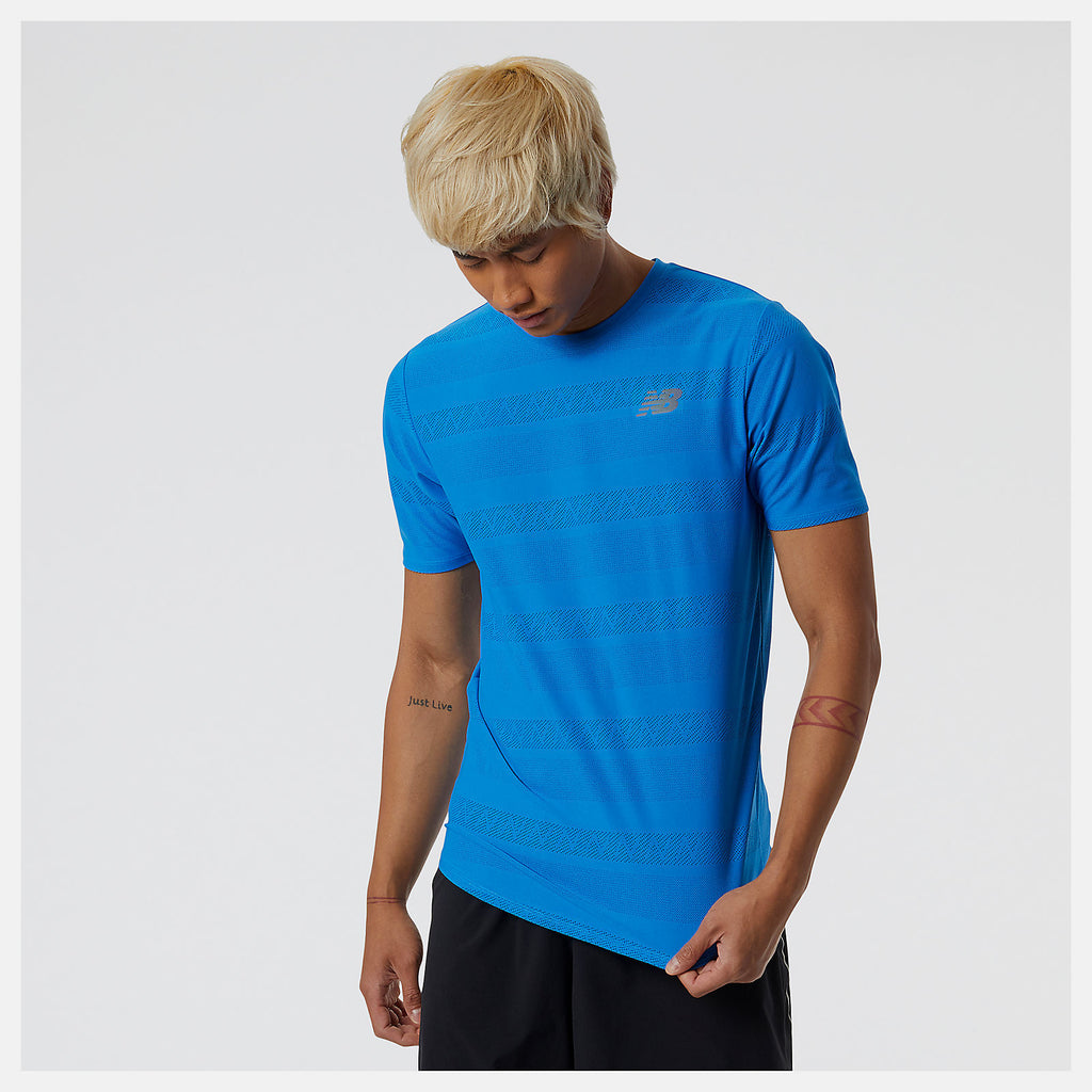 Men's New Balance Q Speed Short Sleeve. Blue. Front view.