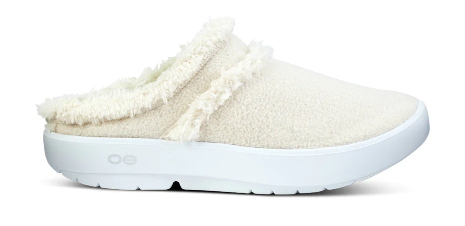 Oofos OOcoozie Mule. Off White upper. White midsole. Lateral view.